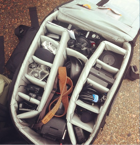 Knapsack with assorted camera gear