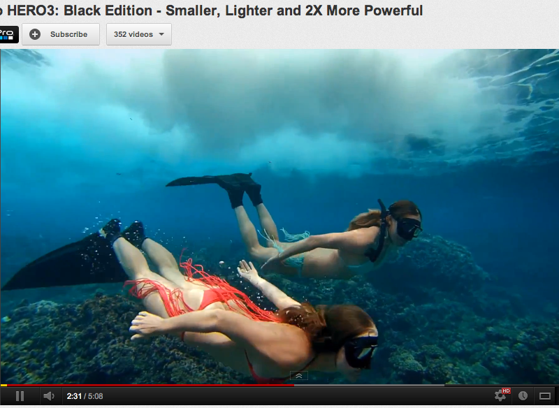 Two girls snorkeling, underwater shot